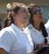 Cornelia Connelly School students (l to r) Alyssa Rodriguez and Daniela Zavala look to the sky as they wait for Endeavour’s historic flight over the campus Friday. 
Photo by Margaret Meland