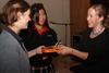 Laura Resau, author of Red Glass, spoke to Connelly students Sept. 16 at a special assembly. Red Glass, the school\'s All-School-Reading book, won the International Reading Association\'s Young Adult Fiction Award. Resau spoke to students about her writing process, her experiences living in Mexico and how her anthropological-style of research shapes her books. Red Glass took Resau six years to complete. Her talk included photos of many of the people she met while living and teaching English in Mexico - people who inspired the characters in Red Glass. She also led two writing workshops for students, encouraging them to use their senses when writing. In the workshops, she challenged students to create characters from magazine photos and write descriptively using their senses. Students were asked to describe the characters as animals or plants, and describe their smells, favorite foods and native languages. Resau challenged students to imagine what the photgraphed characters were like, not just in a photo, but on the inside also. Students made several mosaic walls throughout the campus, showcasing colorful paper tiles with their strongest memories and images from the book. 